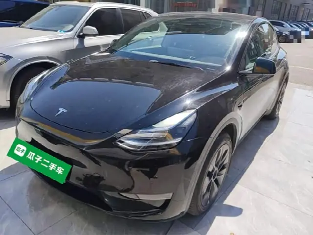 Tesla Model Y 2023, 27 700 км